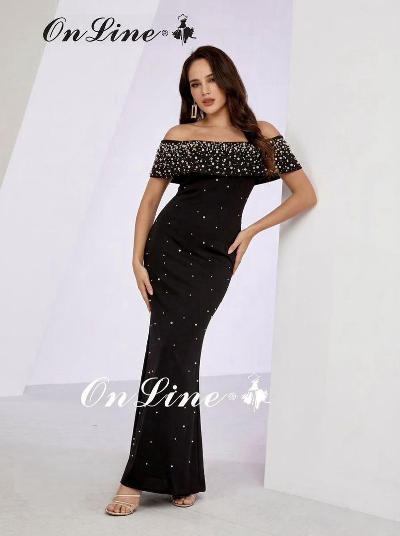Pearl-embellished off-shoulder black gown